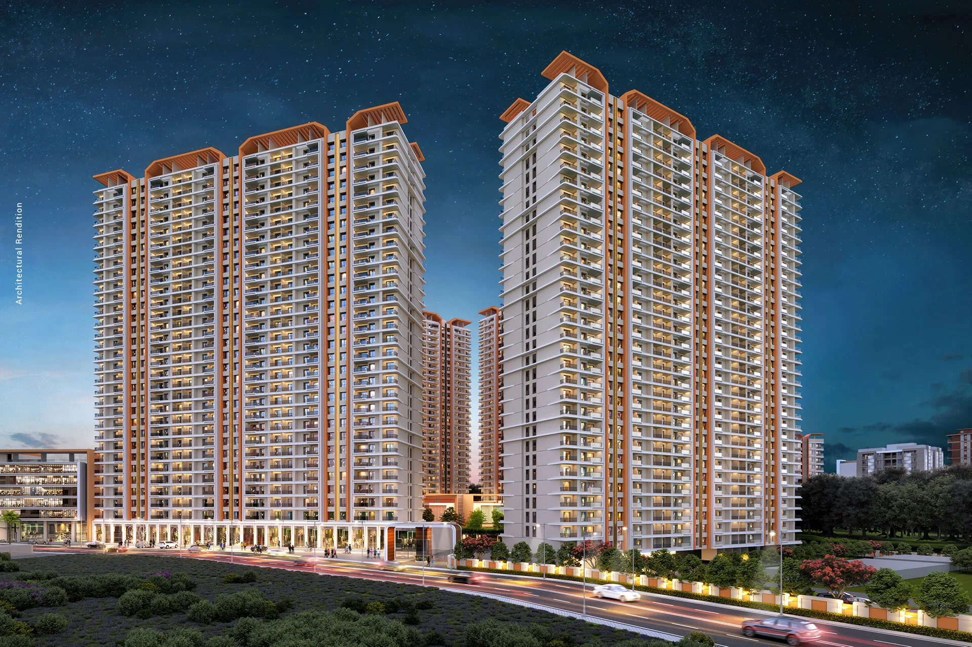 Two high-rise apartment buildings illuminated at night, showcasing Nyati Emerald's luxurious residences and vibrant lifestyle.